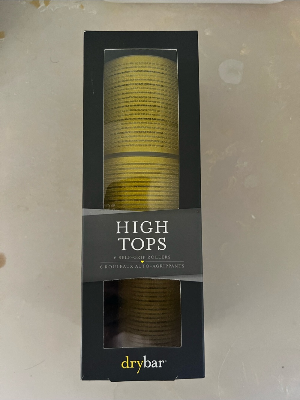 Drybar High Tops Self-Grip Rollers, 2 large and 2 medium rollers.